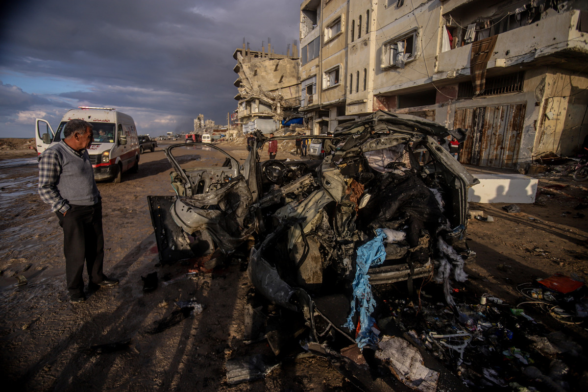Four Palestinians lost their lives after an Israeli airstrike that targeted a vehicle at Al-Rashid Al-Bahri Street in the western part of Gaza City, Gaza on December 13, 2025. [Saeed M. M. T. Jaras - Anadolu Agency]