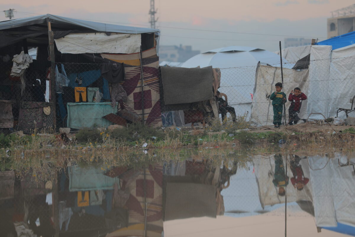 Palestinians living in the Nuseirat Refugee Camp struggle maintaining their daily lives amid the rubble left behind by Israeli attacks in the central Gaza Strip on December 17, 2025. [Hassan Jedi - Anadolu Agency]