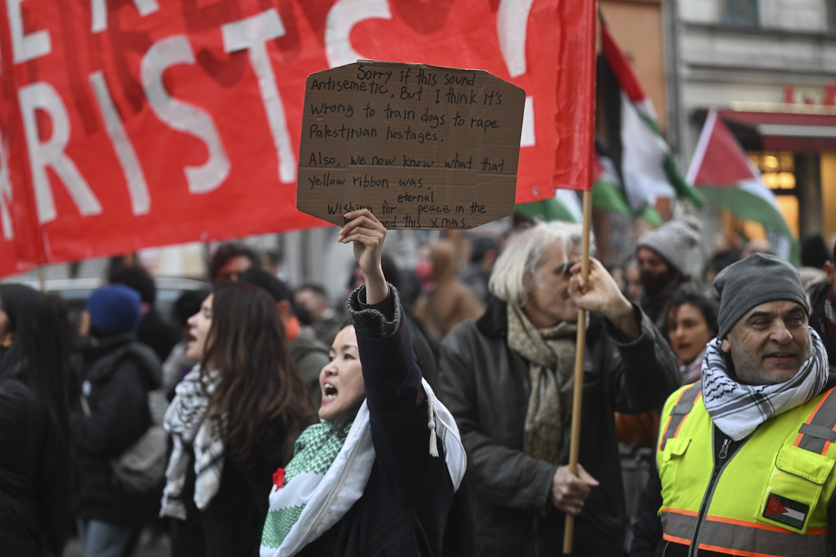 Demonstrators holding Palestinian flags and placards gather at Oranienplatz in the Kreuzberg district and march through the city center during a pro-Palestinian demonstration calling for sanctions against Israel in Berlin, Germany on December 20, 2025. [Halil Sağırkaya - Anadolu Agency]