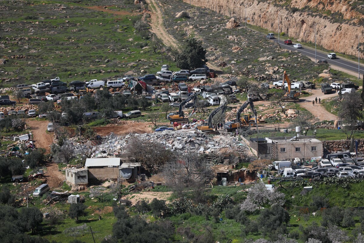 Israeli forces demolish a Palestinian-owned building in West Bank ...