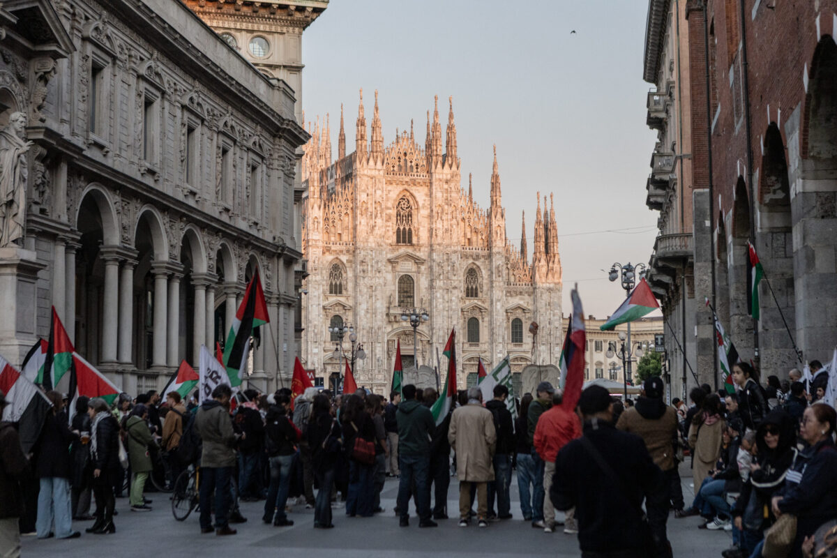 People holding Palestinian flags and banners gather in Piazza Duomo and walk together to a protest against the Israeli law proposing the death penalty for Palestinian prisoners in Milan, Italy, on April 2, 2026. [Andrea Carrubba - Anadolu Agency]