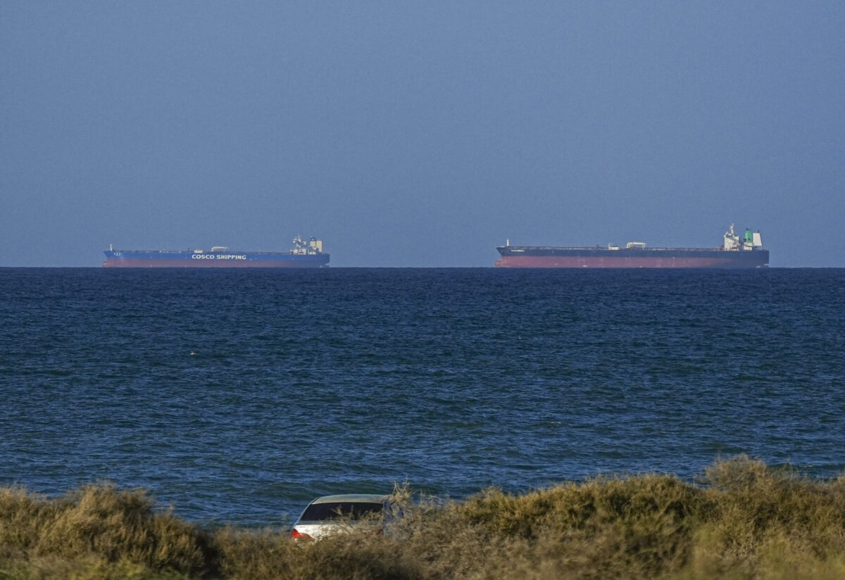 A ship waits to pass through the Strait of Hormuz following the two-week temporary ceasefire between the US and Iran, which is conditional on the opening of the strait, in Oman on April 8, 2026. Shipping traffic remained at low levels, reported. [Shady Alassar - Anadolu Agency]