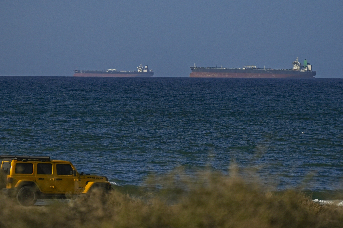 A view of the vessels passing through Strait of Hormuz following the two-week temporary ceasefire reached between the United States and Iran on the condition that the strait be reopened, seen in Oman on April 08, 2026. [Shadi J. H. Alassar - Anadolu Agency]