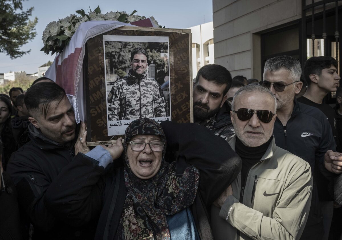 People attend a funeral ceremony for 13 security personnel, who lost their life in Israeli airstrikes near a government complex and a State Security office in Nabatieh, on April 11, 2026 in Sidon, Lebanon. [Murat Şengül - Anadolu Agency]
