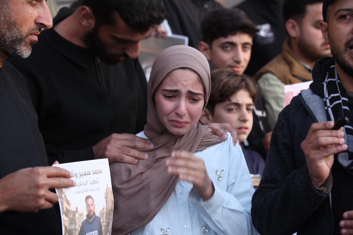 Sumeyye Visha, the daughter of the journalist who lost his life cries as a group of Palestinians hold a solidarity event for Muhammad Samir Visha, a journalist for Al Jazeera Mubasher who was killed in an Israeli attack in the Bureij Refugee Camp in Deir al-Balah, Palestine, on April 11, 2026. [Moiz Salhi - Anadolu Agency]
