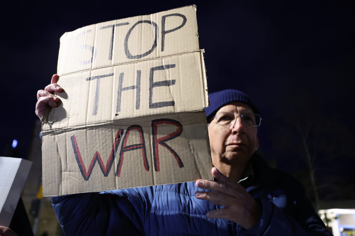Dozens of Israelis carrying placards and banners gather at Paris Square to protest the ongoing attacks by the US and Israel on Iran and Lebanon, calling for an end to the war in West Jerusalem, on April 11, 2026. [Saeed Qaq - Anadolu Agency]