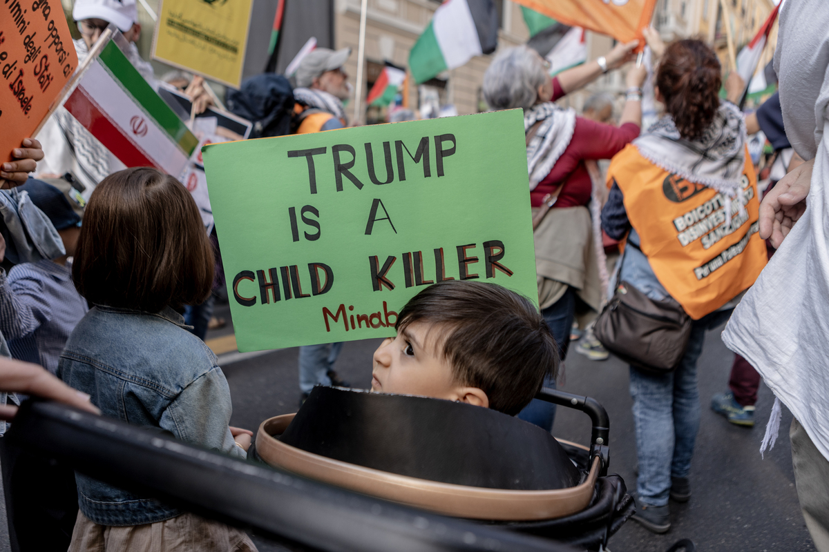 People, holding Palestinian and Lebanese flags and banners, march in a protest against Israel's attack on Lebanon and the decision by the Knesset, Israel's parliament, to introduce the possibility of sentencing Palestinian prisoners to death in Milan, Italy, on April 11, 2026. [Andrea Carrubba - Anadolu Agency]