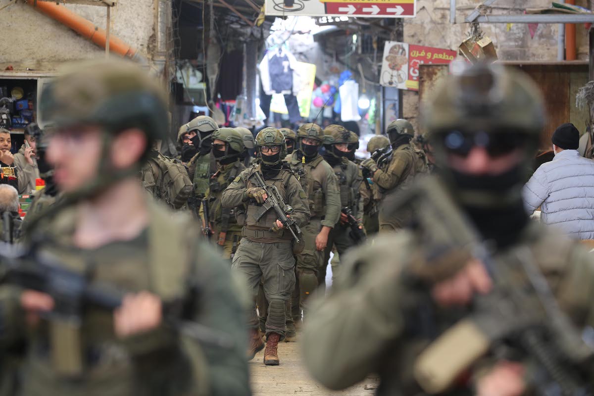 Israeli soldiers stand on a street during an Israeli army raid in the northern West Bank city of Nablus, in Nablus, West Bank, Palestine on April 12, 2026. [Nedal Eshtayah - Anadolu Agency]