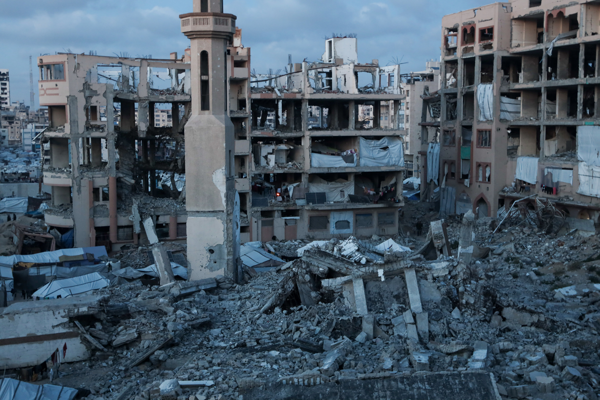Displaced Palestinian families live in makeshift tents and damaged buildings within the campus of the Islamic University of Gaza, which was heavily destroyed by Israeli attacks, in Gaza City, Gaza, Palestine on April 12, 2026. [Abdalhkem Abu Riash - Anadolu Agency]