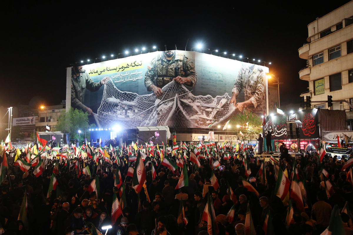 Iranians gather at Enqelab Square to protest against the United States and Israel in Tehran, Iran, on April 12, 2026. [Fatemeh Bahrami - Anadolu Agency]