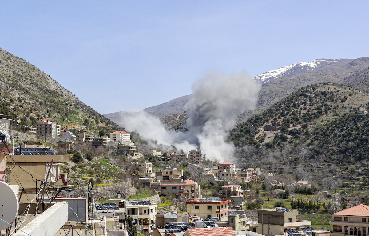 Smoke rises from targeted areas in the town of Shebaa in Lebanon’s Nabatieh province following an airstrike, on April 14, 2026. [Ramiz Dallah - Anadolu Agency]
