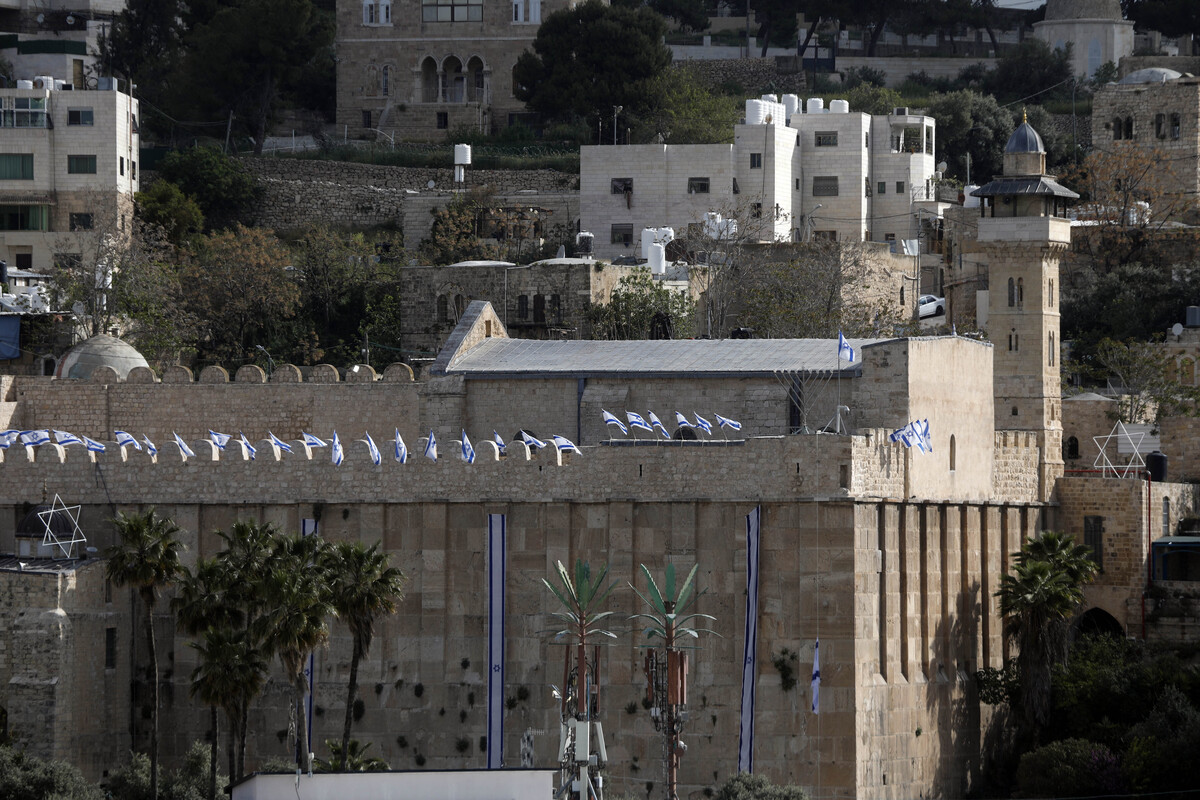 The general view of the Ibrahimi Mosque, where the Israeli administration, using Israel's Independence Day as a pretext, has placed Israeli flags in some sections, as well as the Star of David and menorah symbols in Hebron, West Bank, Palestine on April 21, 2026. [Mamoun Wazwaz - Anadolu Agency]