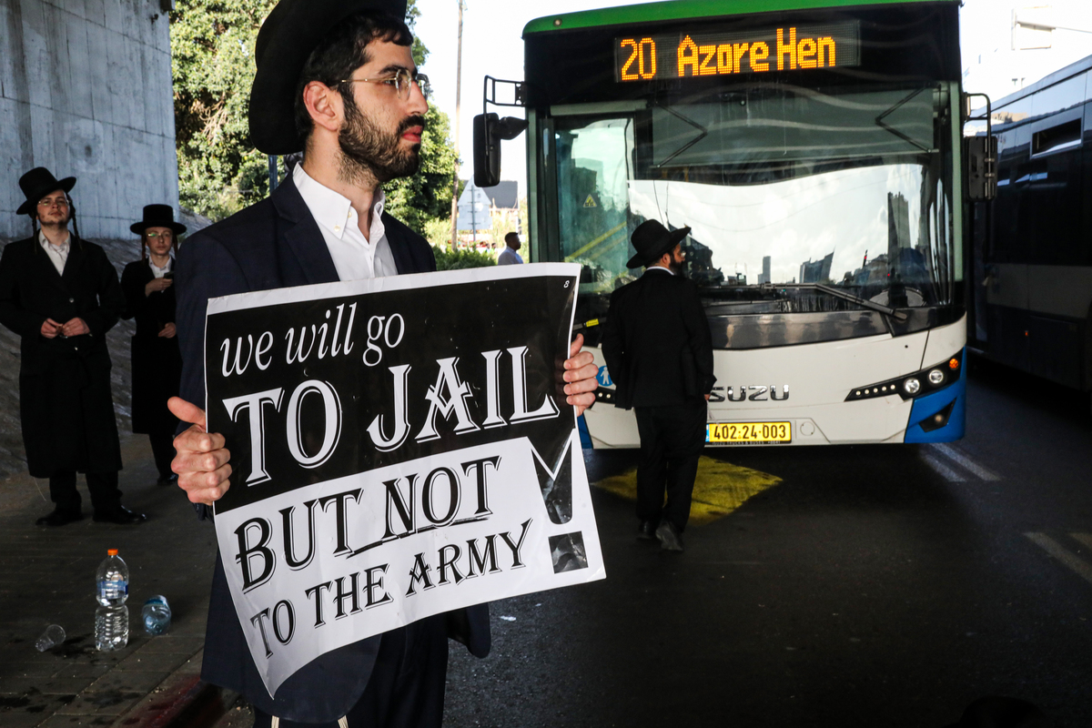 Ultra-Orthodox Jews (Haredi) protest against the failure to pass a legal arrangement exempting yeshiva students from mandatory military service and the issuance of draft notices to members of their community in Tel Aviv, Israel on April 28, 2026. [Gideon Markowicz - Anadolu Agency]