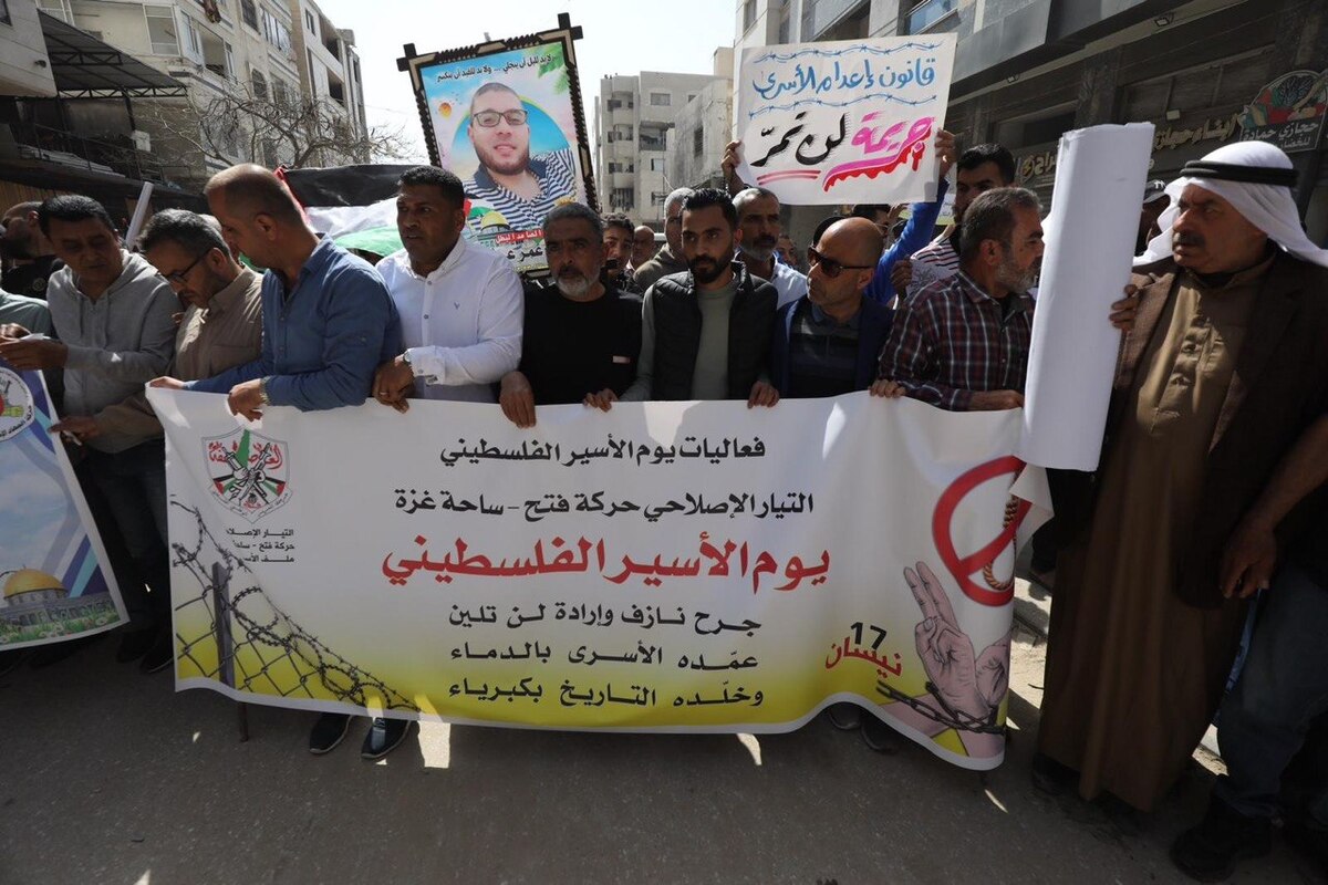 People gather to stage a protest against Israel’s death penalty law targeting Palestinian detainees within the "Palestinian Prisoners' Day" in Gaza City, Gaza, Palestine on April 16, 2026. [Mohammed Asad/Middle East Monitor]