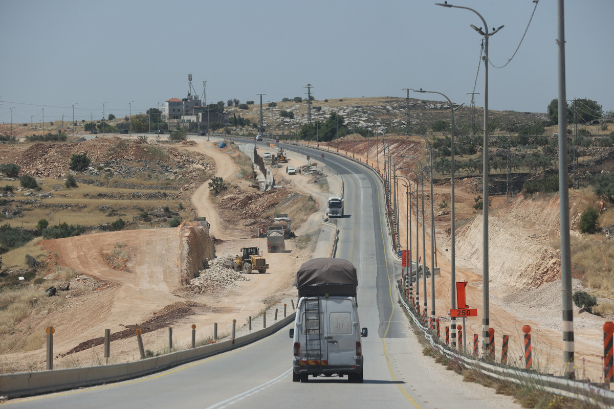 Israel’s road construction and land expropriation related to the expansion of the “Ariel” settlement cause damage to agricultural lands and alter the region’s geographic landscape using heavy machinery in the village of Marda, part of Salfit, West Bank, Palestine, on June 9, 2026. [Issam H.s. Alasmar - Anadolu Agency]