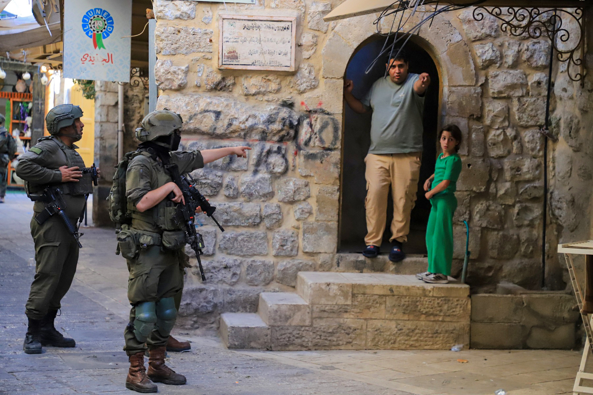 Israelis raid the Old City area, restricting Palestinian movement as military units block the entrances on June 13, 2026, in Hebron, West Bank. [Amer Shallodi - Anadolu Agency]