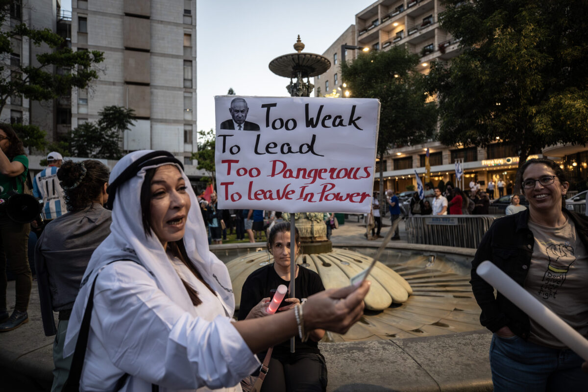 Israelis chanting slogans and carrying banners gather at Paris Square to protest against Prime Minister Benjamin Netanyahu, opposing the attacks on Gaza and the current government’s war policies in West Jerusalem, on June 13, 2026. [Mostafa Alkharouf - Anadolu Agency]