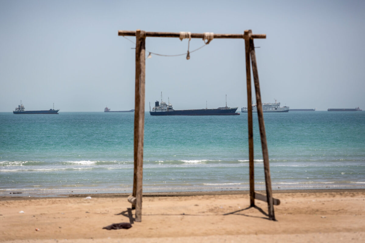 Iranian commercial ships are seen off the coast of Kong city in southern Iran on June 21, 2026, after the United States eased its blockade in the Strait of Hormuz. [Hassan Ghaedi - Anadolu Agency]