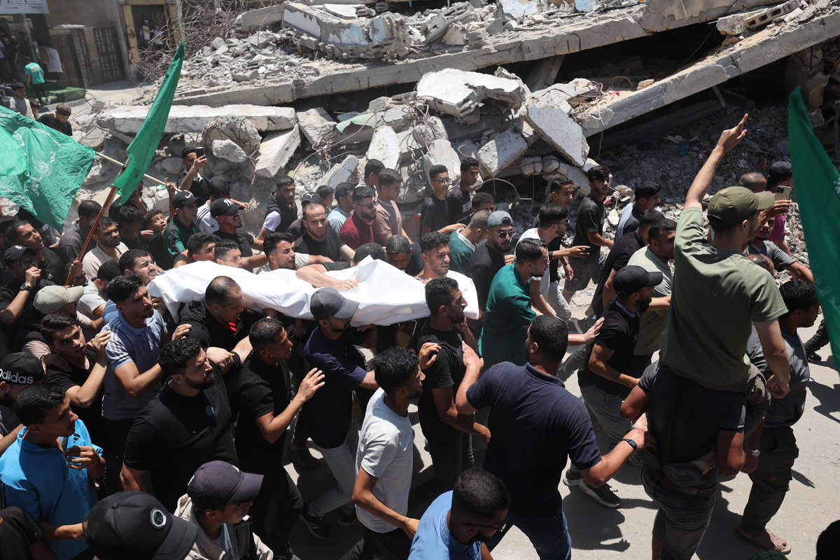 Palestinians attend a funeral ceremony in the Nuseirat refugee camp for police officer Mansur Sami Shahtut, who lost his life in an Israeli strike on a vehicle in the al-Maghazi refugee camp in Gaza City, Gaza, Palestine on June 27, 2026. [Mahmoud Abu Hamda - Anadolu Agency]