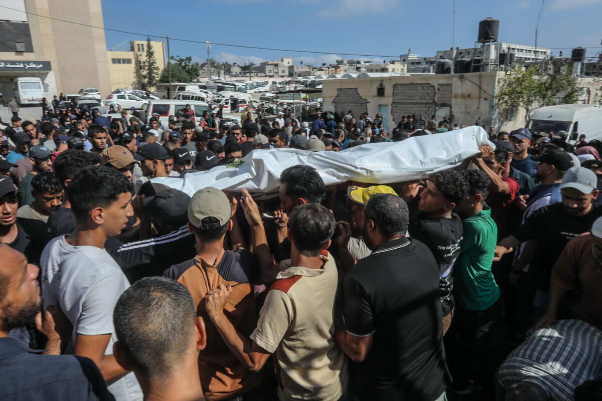 Citizens and relatives of the three Palestinians, including 9-year-old Tariq Sabah and his uncle Omar Sabah, who died as a result of the Israeli attack on the tents of displaced Palestinians in the Al-Mawasi area of Khan Yunis despite the ceasefire, attend the funeral ceremony in front of Nasser Hospital in Khan Yunis, Gaza, Palestine, on July 1, 2026. [Abed Rahim Khatib - Anadolu Agency]