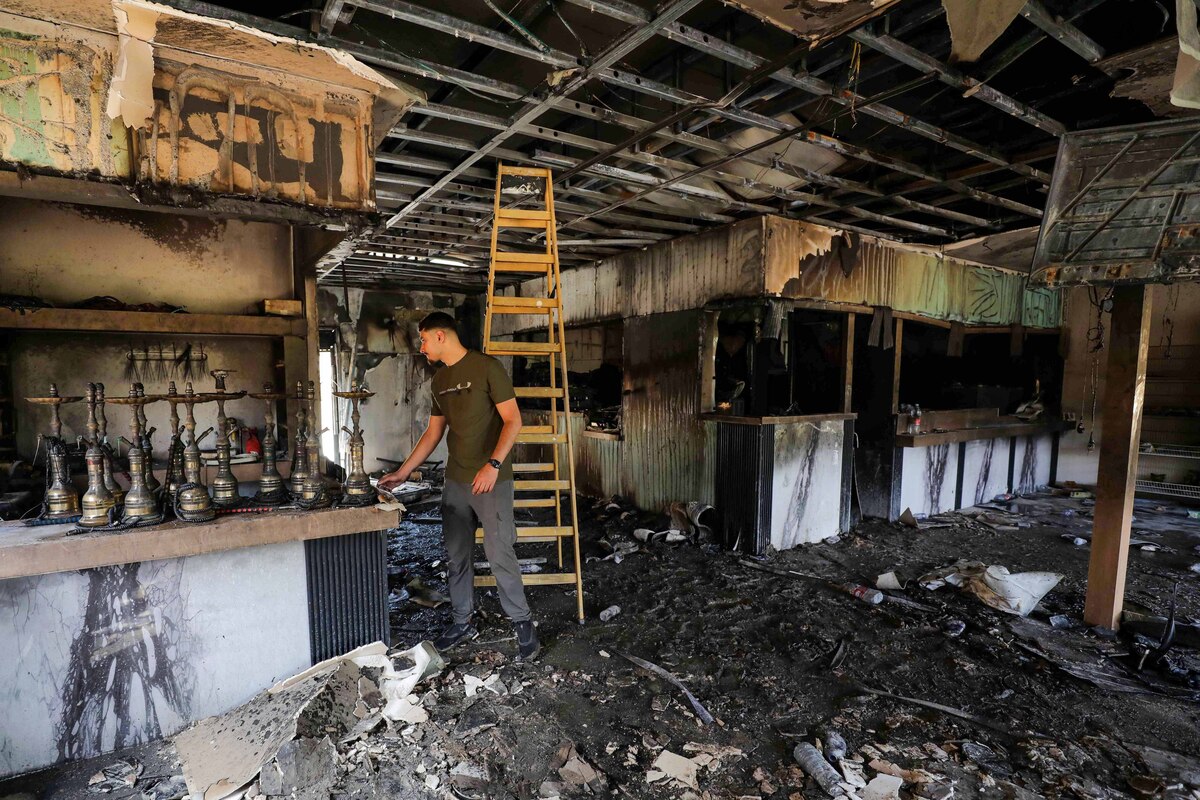 The interior of a restaurant is seen heavily damaged after Israeli settlers raided and set fire to the building near An-Najah National University in Nablus, in West Bank, on July 5, 2026. [Nedal Eshtayah - Anadolu Agency]