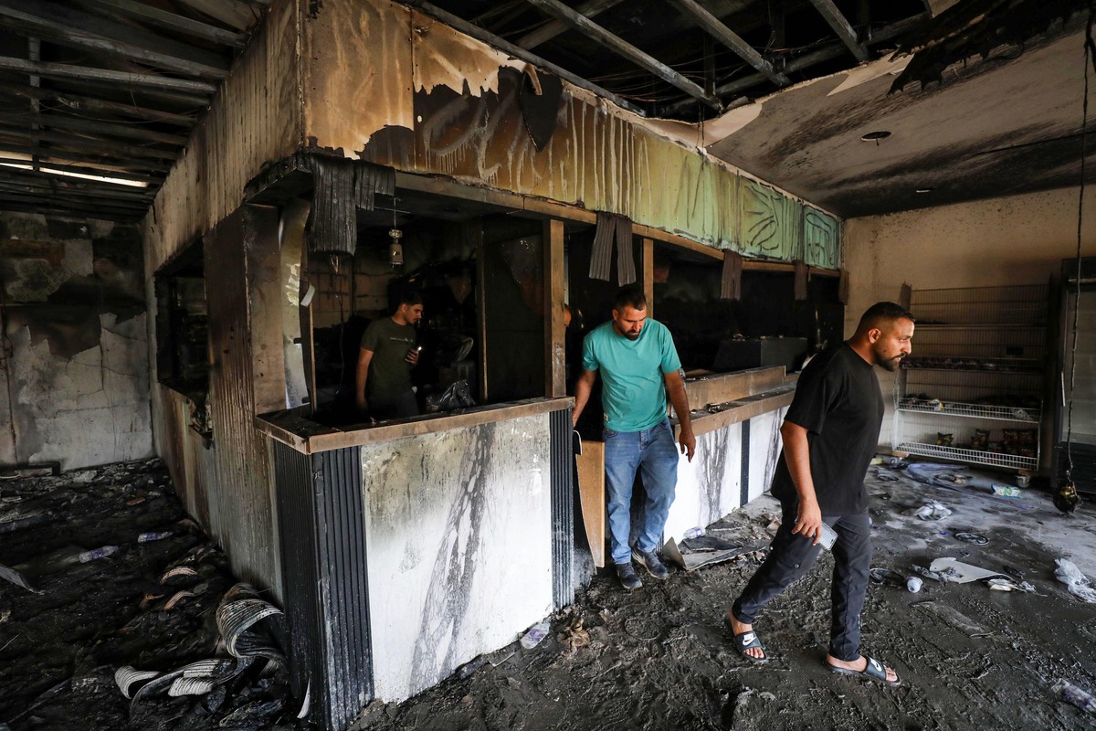 The interior of a restaurant is seen heavily damaged after Israeli settlers raided and set fire to the building near An-Najah National University in Nablus, in West Bank, on July 5, 2026. [Nedal Eshtayah - Anadolu Agency]