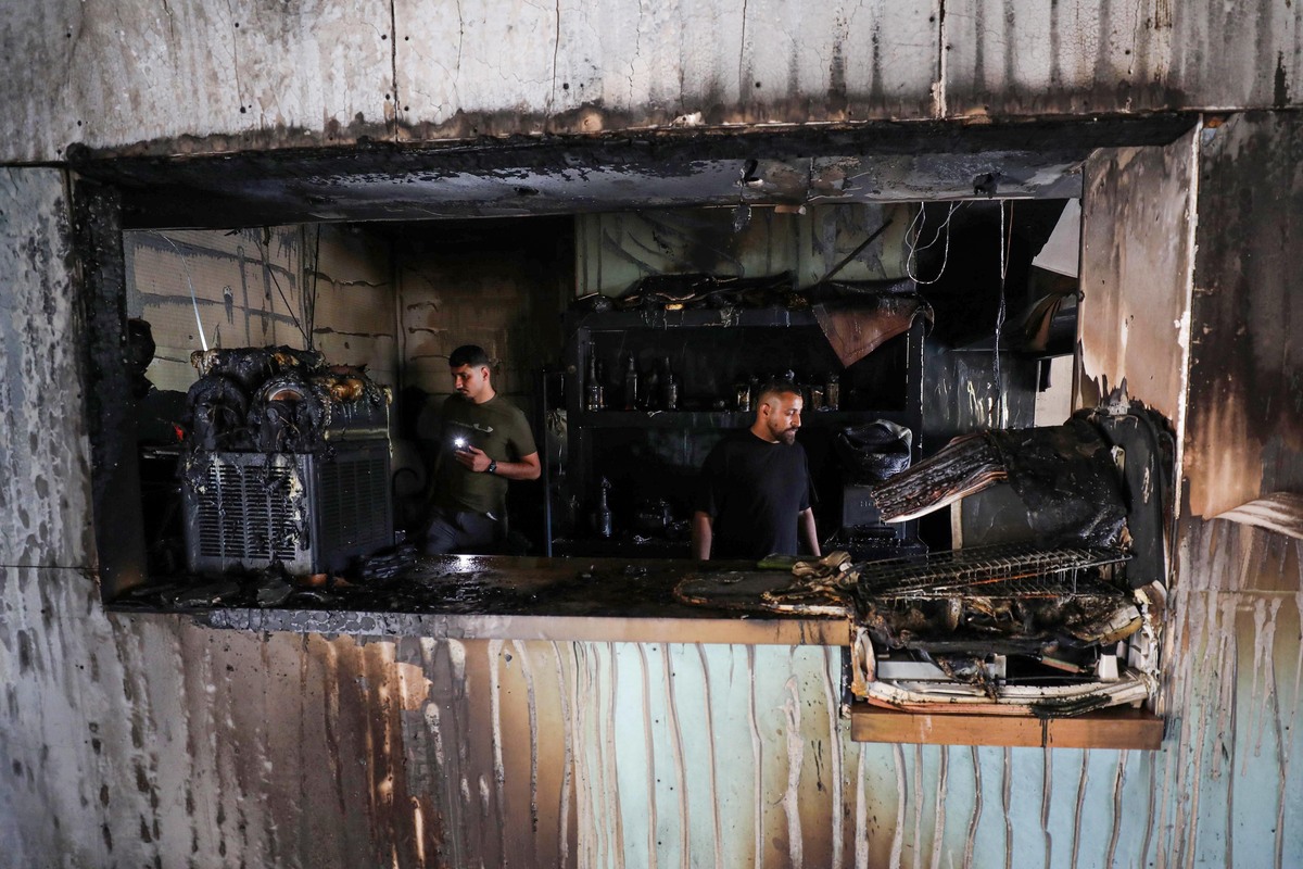 The interior of a restaurant is seen heavily damaged after Israeli settlers raided and set fire to the building near An-Najah National University in Nablus, in West Bank, on July 5, 2026. [Nedal Eshtayah - Anadolu Agency]