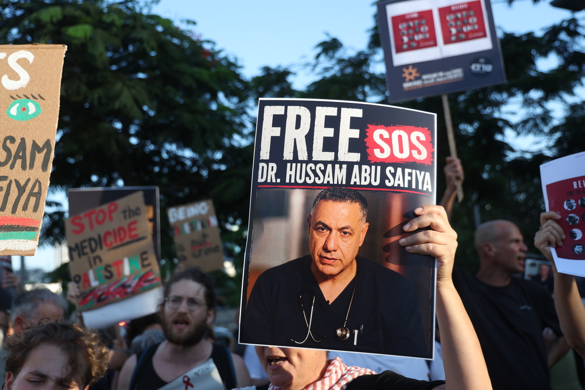 Activists gather to stage a protest demanding the release of Dr. Hussam Abu Safiya, director of Kamal Adwan Hospital, in Tel Aviv, Israel on July 06, 2026. [Saeed Qaq - Anadolu Agency]
