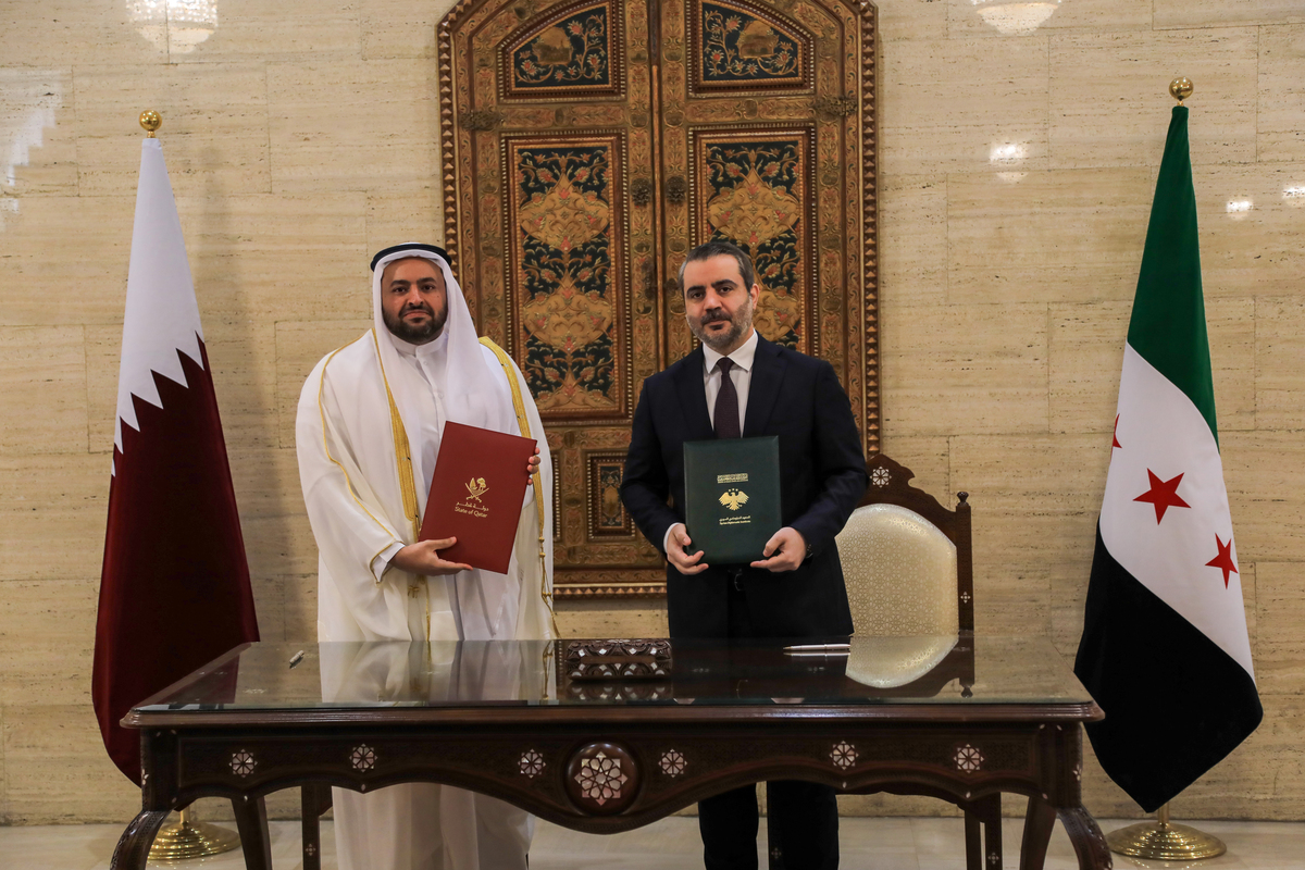 Syrian Foreign Minister Asaad Hassan al-Shaibani (R) and Qatar's Minister of State for Foreign Affairs Mohammed bin Abdulaziz Al Khulaifi (L) pose for a photo after signing a memorandum of understanding on cooperation in diplomatic affairs and training at Tishreen Palace in Damascus, Syria, on July 11, 2026. [Hişam Hac Ömer - Anadolu Agency]