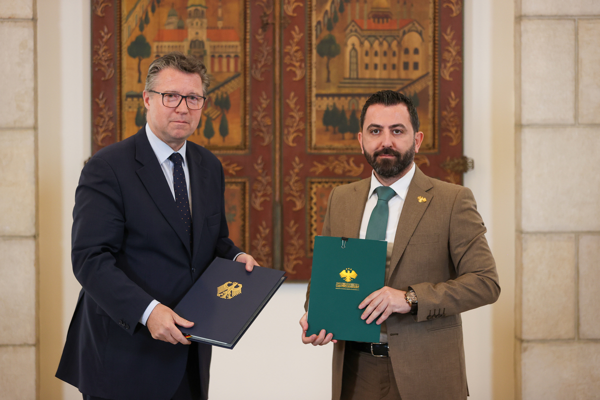 Deputy Director General of the Syrian Civil Aviation and Air Transport Authority, Samih al-Arabi (R), and State Secretary of the German Federal Foreign Office, Geza Andreas von Geyr (L), sign a civil aviation cooperation agreement during a ceremony attended by Syrian Foreign Minister Asad Hasan Sheybani at the Tishreen Palace in Damascus, Syria on July 16, 2026. [Izz Aldien Alqasem - Anadolu Agency]