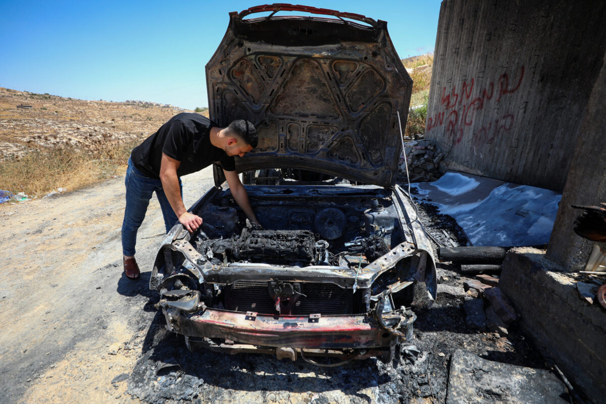 Israeli settlers set fire to a Palestinian-owned vehicle in the village of Abu Njeim, leaving the vehicle completely destroyed and unusable in southeast of Bethlehem, West Bank, Palestine on July 29, 2026. [Wisam Hashlamoun - Anadolu Agency]