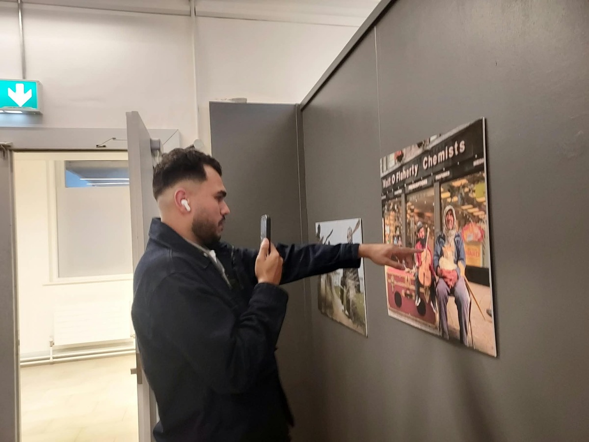 ABDULGAZA Abdelrahman shows one of his stunning visual images to a family member back in Gaza.