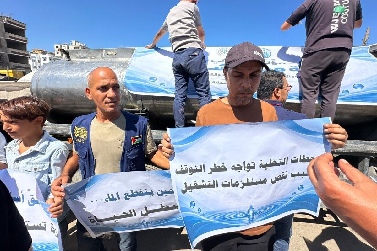 Water station owners staged a sit-in protest, warning of looming shortages of essential oil, spare parts, and water filters, on 23 september 2026 [Mohammed Asad/Middle East Monitor]